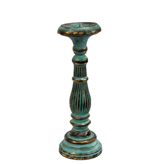 Decorative teal candle holder with gold accents on a white background