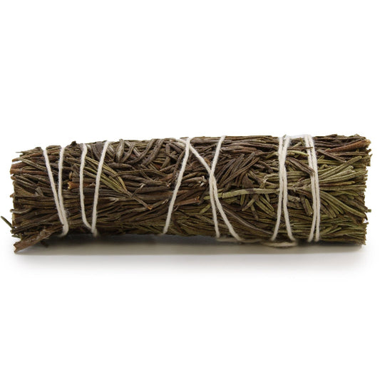 Bundled sage with twine on a white background