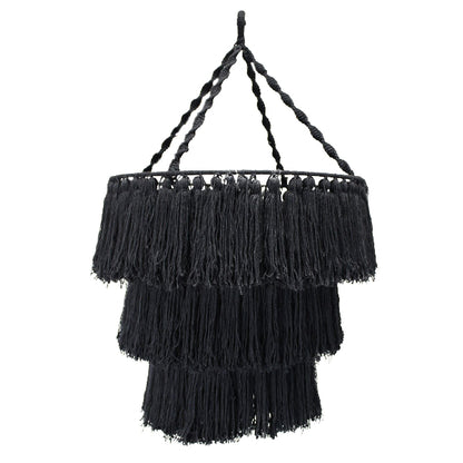 Black fringe lampshade with braided handle on a white background
