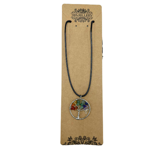 Necklace with a tree of life pendant on a JFC Jewellery branded card.