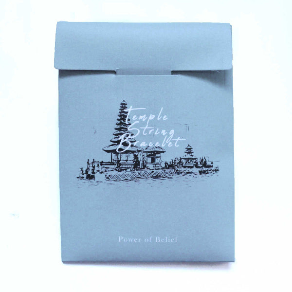Light blue box with temple design and text on a white background