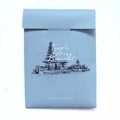 Light blue box with temple design and text on a white background