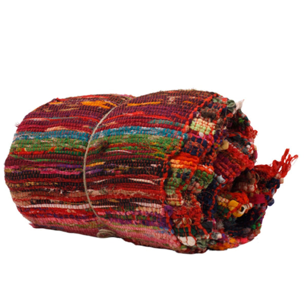 Multicolored textured fabric roll on a white background
