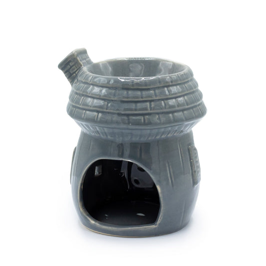 Gray textured wax warmer on a white background