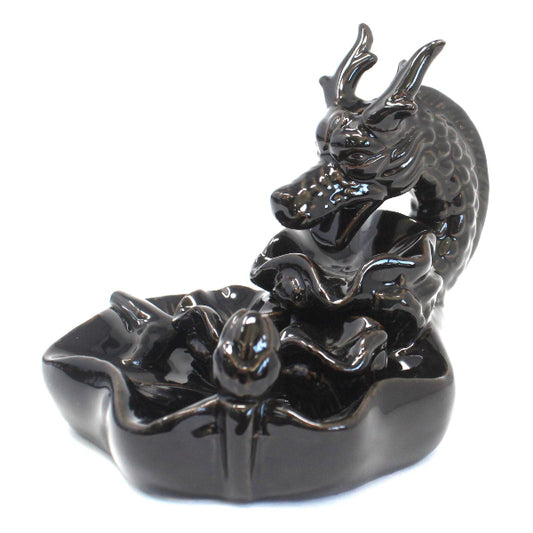 Black dragon incense burner on a white background