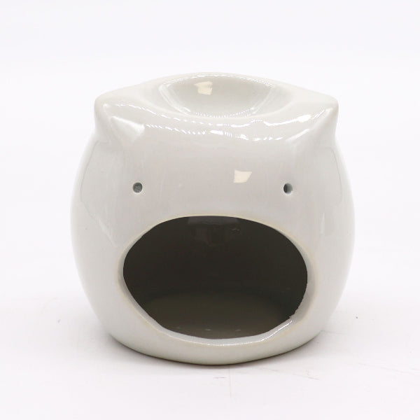 White ceramic cat-shaped oil burner on a white background