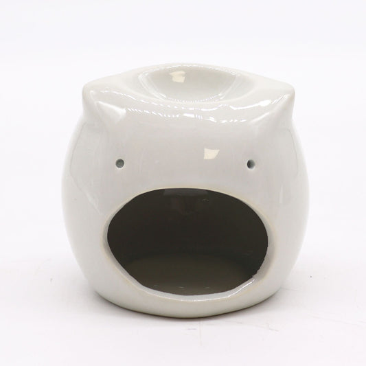 White ceramic cat-shaped oil burner on a white background