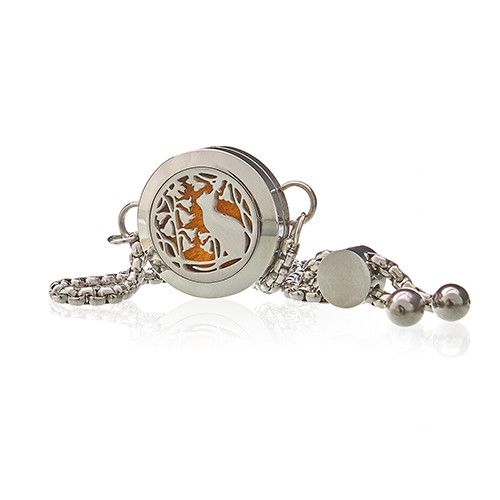 Silver bracelet with a round charm featuring a deer design on a white background