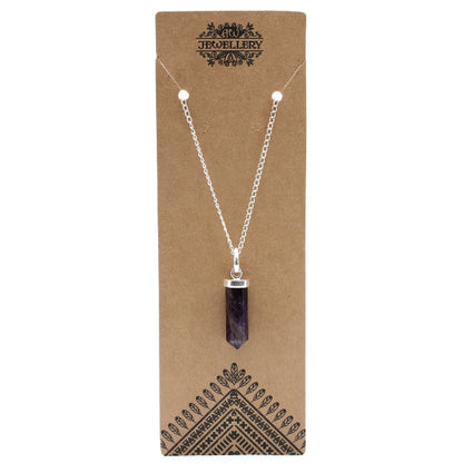Necklace with a pendant on a brown card with 'Jewellery' branding.