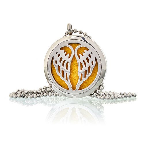 Silver pendant with a yellow center and leaf design on a white background