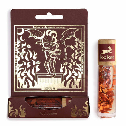 Red Jasper product packaging with decorative design and a tube of Topillare on a white background