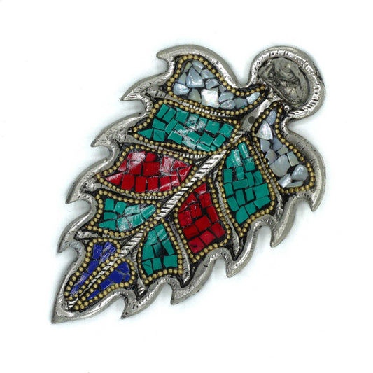 Decorative feather-shaped object with mosaic colors on a white background