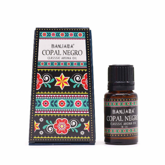 Banjara Copal Negro aroma oil packaging with decorative box and bottle on a white background
