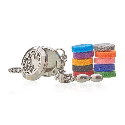 Silver aromatherapy diffuser necklace with colorful bracelets on a white background