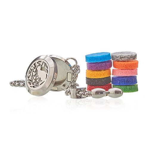 Silver aromatherapy diffuser necklace with colorful bracelets on a white background