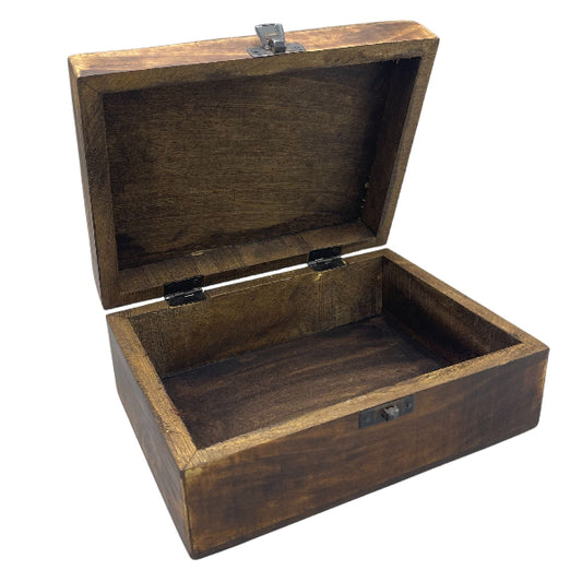 Wooden box with a lid on a white background