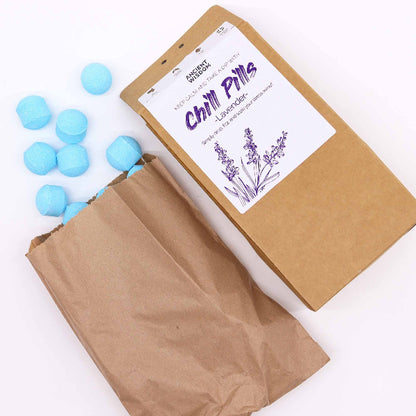 Box of 'Chill Pills' with blue balls on a white background