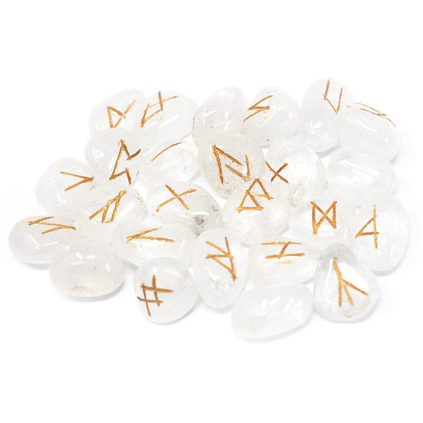 White beads with gold patterns on a white background