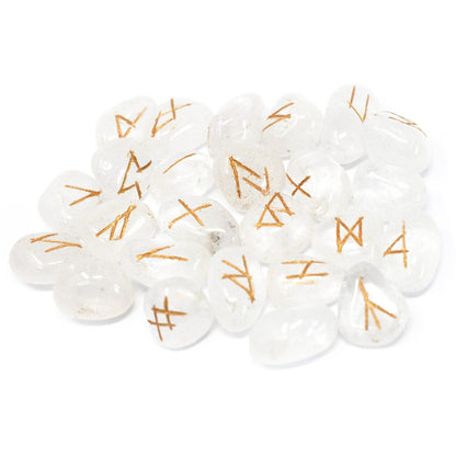 White beads with gold patterns on a white background