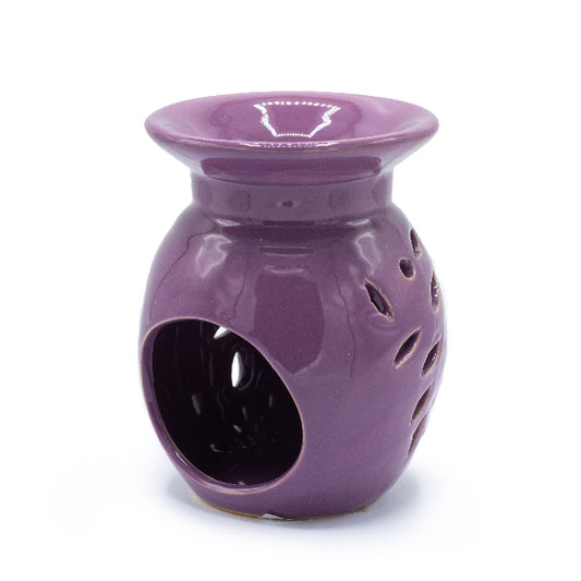 Purple ceramic oil burner on a white background