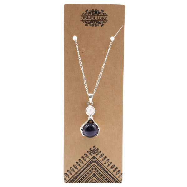 Necklace with a pendant on a brown jewelry card