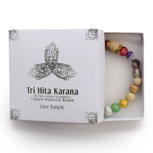 Tri Hita Karana bangle in a box on a white background