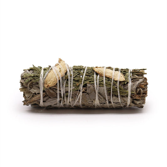 Bundled sage with white string on a white background