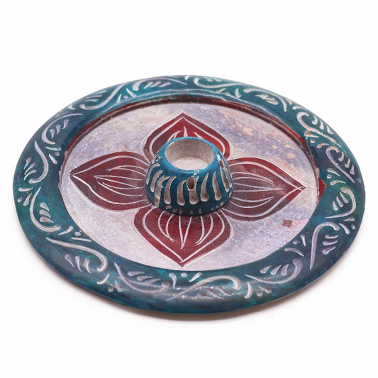 Decorative ceramic plate with floral design on a white background