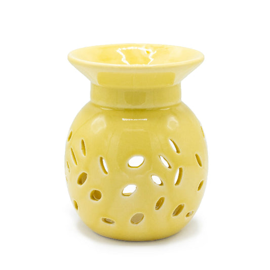 Yellow ceramic diffuser with a textured surface on a white background