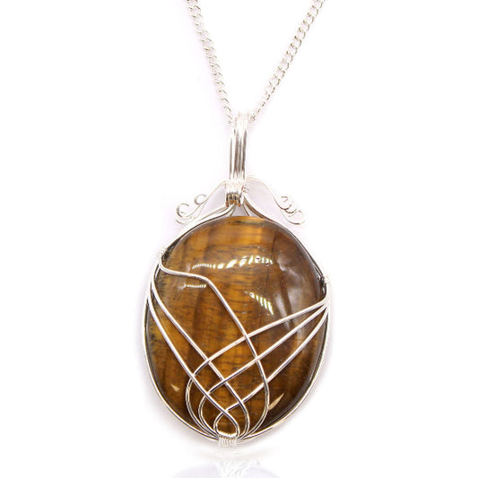Tiger's eye pendant with silver wire wrapping on a white background