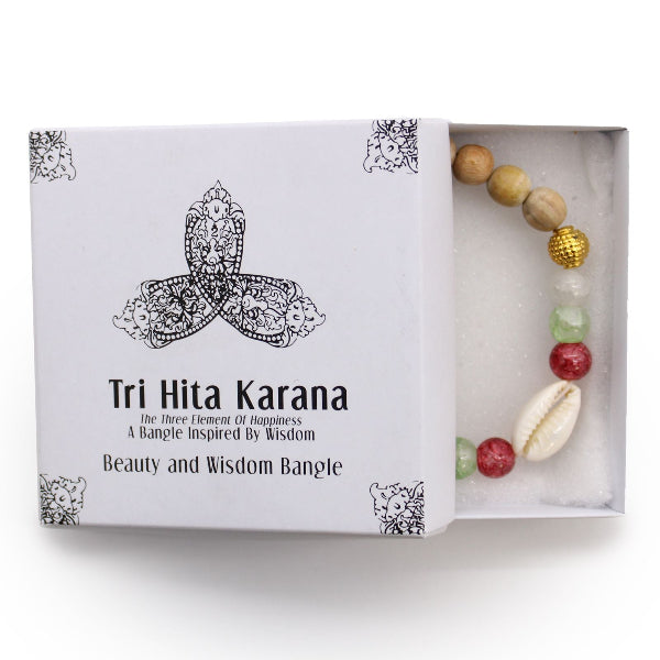 Tri Hita Karana bangle set with a box on a white background