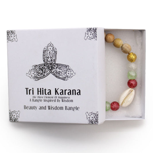 Tri Hita Karana bangle set with a box on a white background