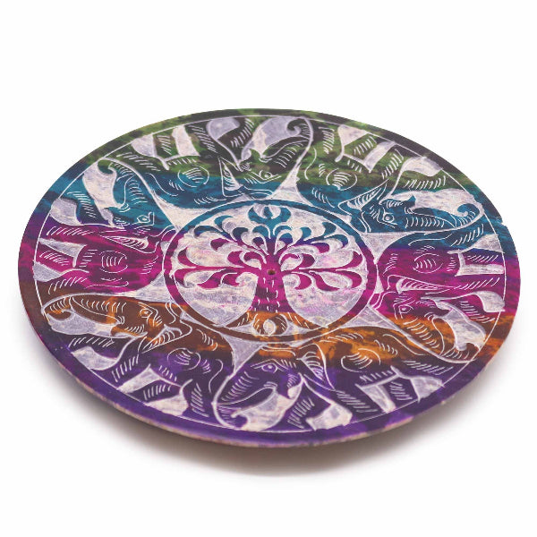 Round colorful coaster with tree of life design on a white background