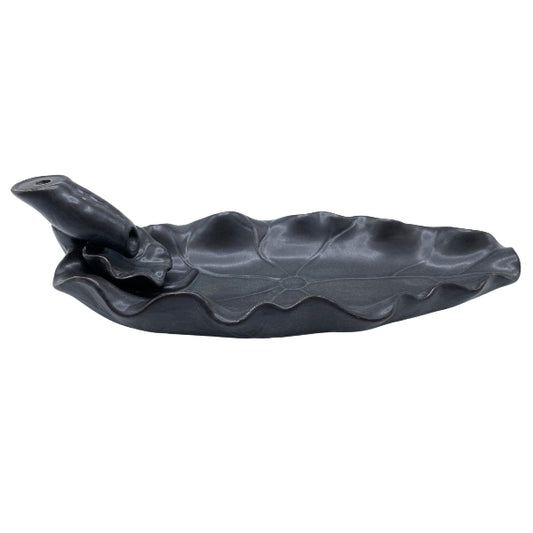Black leaf-shaped garden tool on a white background