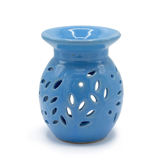 Blue ceramic oil burner with a decorative design on a white background