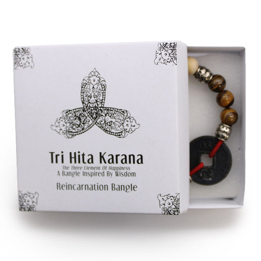 Tri Hita Karana bangle in a box on a white background