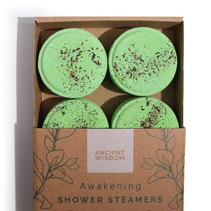 Four green shower steamers in a box labeled 'Ancient Wisdom' on a white background.