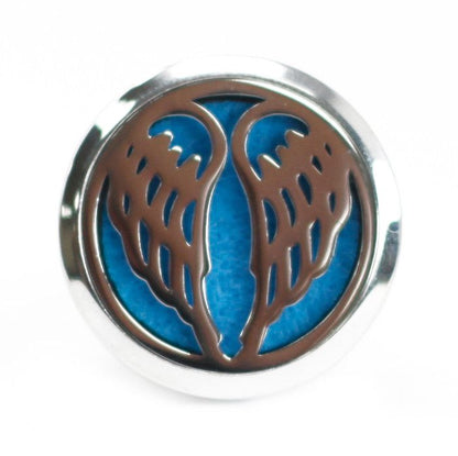 Decorative metal emblem with blue center and brown leaf-like patterns on a white background