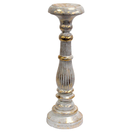 Decorative candle holder with gold accents on a white background