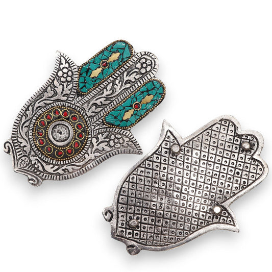 Decorative Hamsa hand pendants on a white background