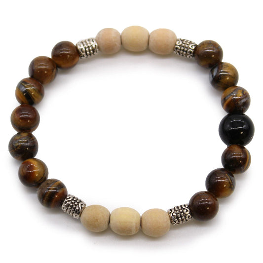 Beaded bracelet with brown, beige, and black beads on a white background