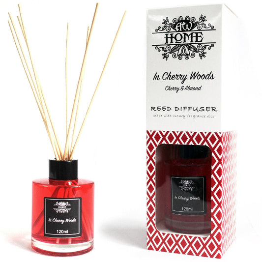 Red reed diffuser with packaging labeled 'At Home' in Cherry Woods on a white background