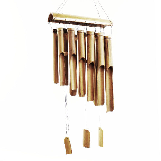 Bamboo wind chime with wooden tubes on a white background