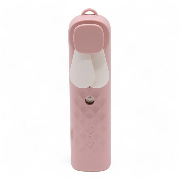 Pink handheld device with a white nozzle on a white background