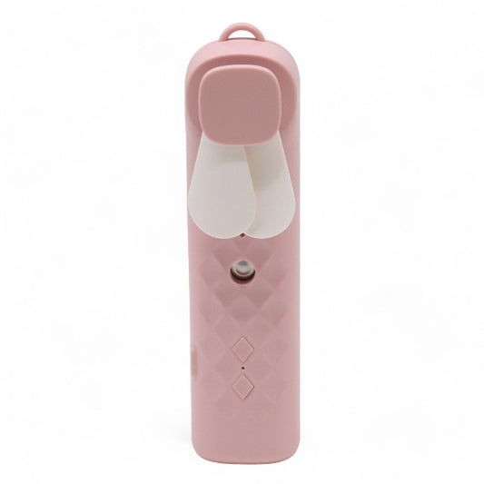 Pink handheld device with a white nozzle on a white background