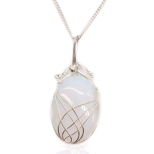 Silver pendant with a teardrop-shaped gemstone on a white background