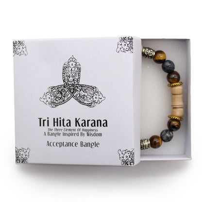 Tri Hita Karana bangle in a white box with decorative design