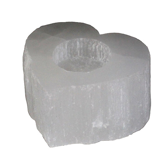 Crystal block with a central hole on a black background