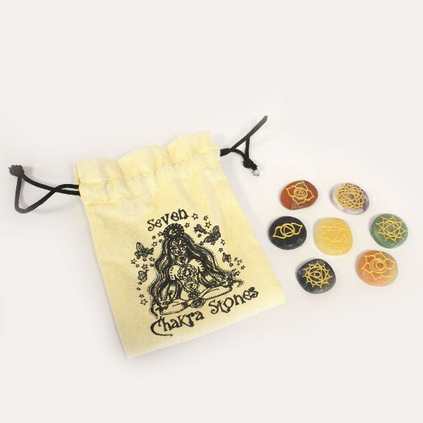 Set of Seven Chakra Stones with a drawstring pouch on a white background