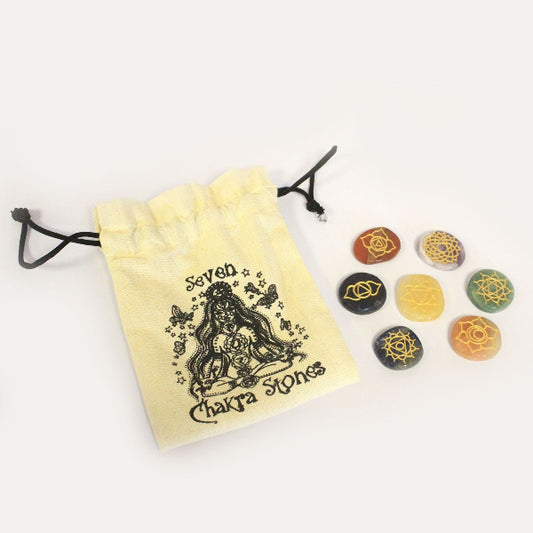 Set of Seven Chakra Stones with a drawstring pouch on a white background